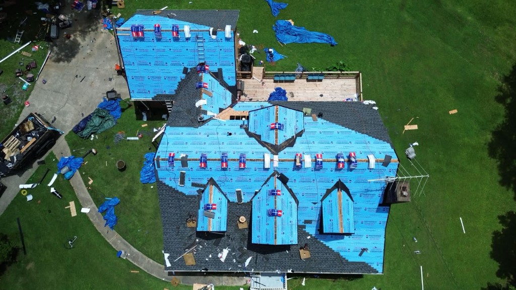 Roof replacement in progress from above