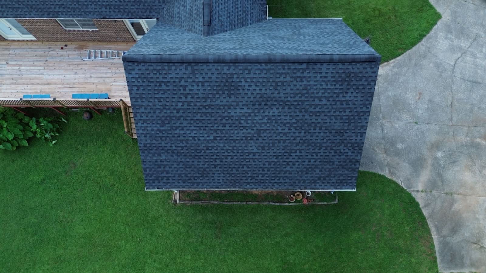 Finished charcoal roof over a rear deck